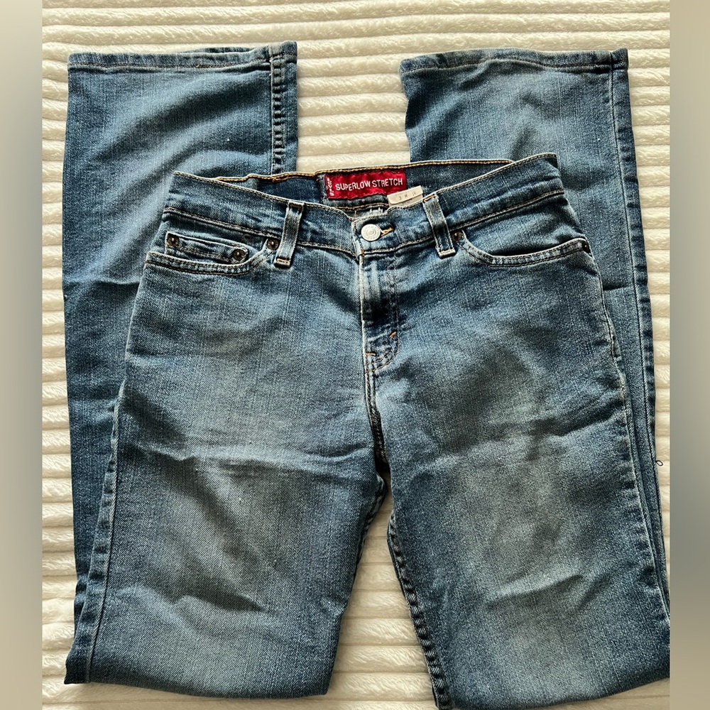 Levi’s mid light wash bootcut mid low rise waist jeans
